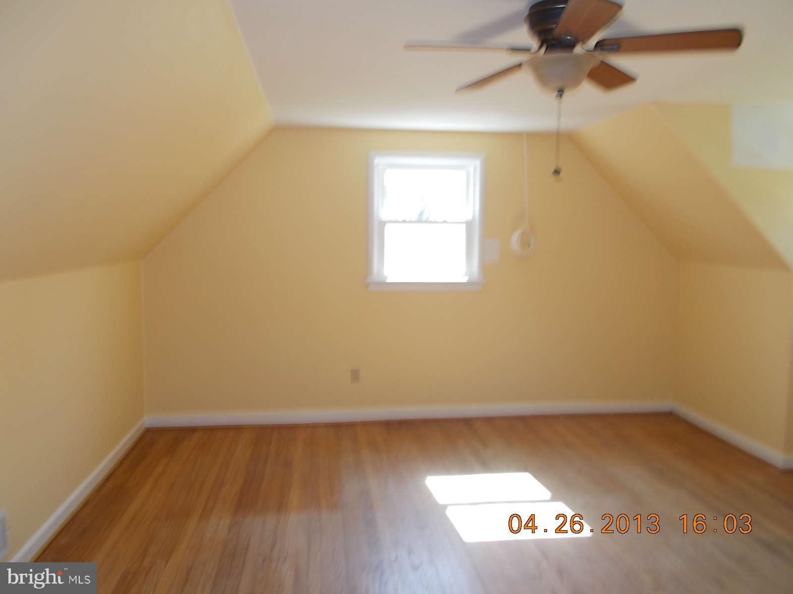 3302 Harrell Street Silver Spring, MD 20906 - Photo 8 of 18 an empty room with a window