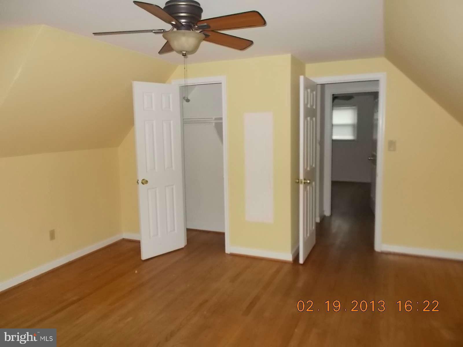3302 Harrell Street Silver Spring, MD 20906 - Photo 9 of 18 a view of a hallway with wooden floor