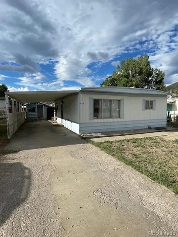 a view of house with outdoor space