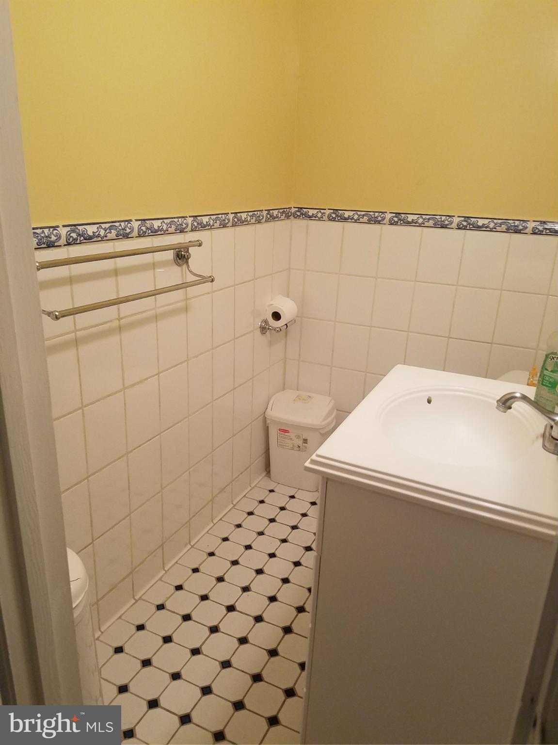 3116 Spring Drive Alexandria, VA 22306 - Photo 8 of 9 a bathroom with a sink and a vanity