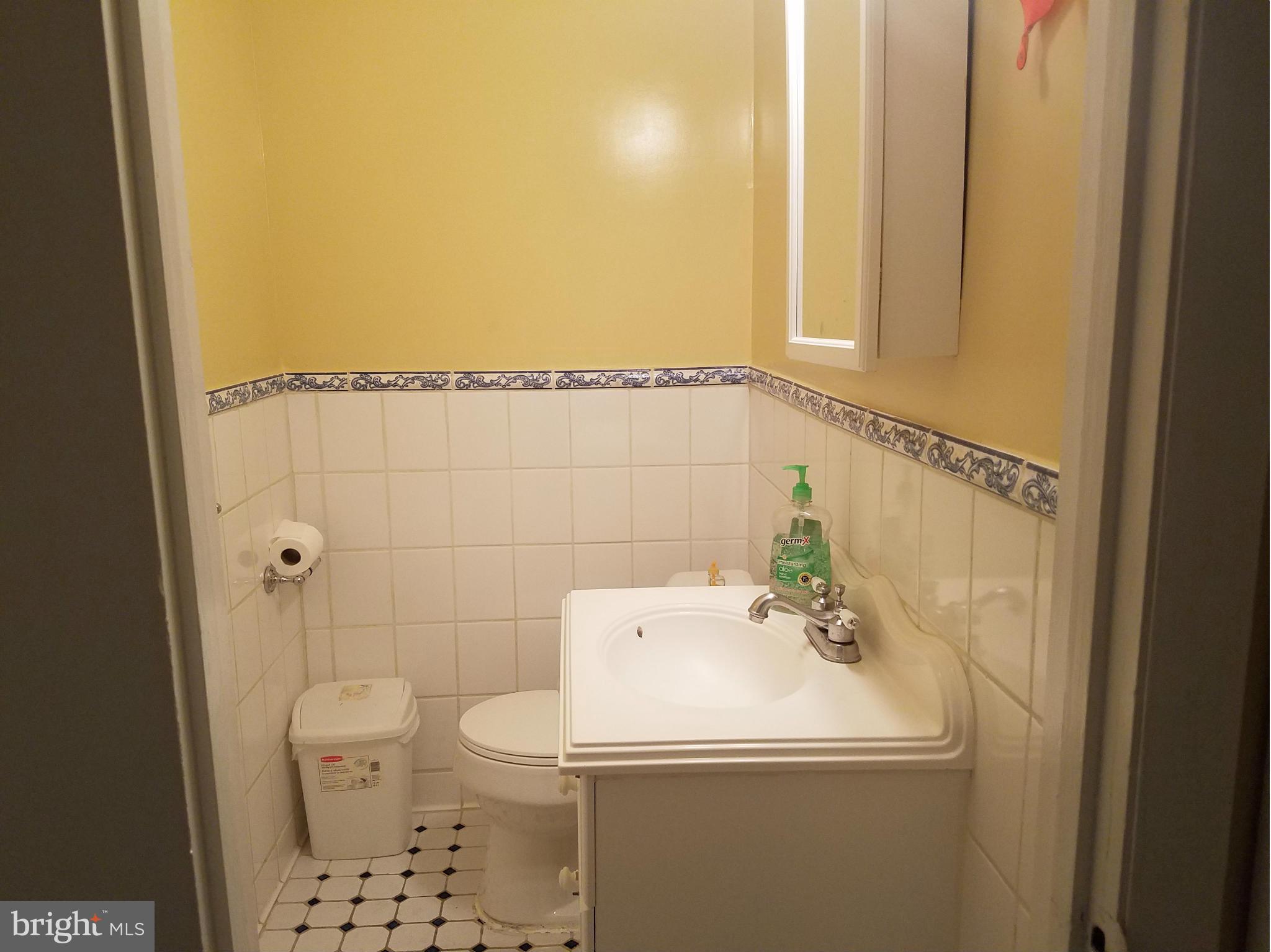 3116 Spring Drive Alexandria, VA 22306 - Photo 9 of 9 a bathroom with a sink a toilet and shower