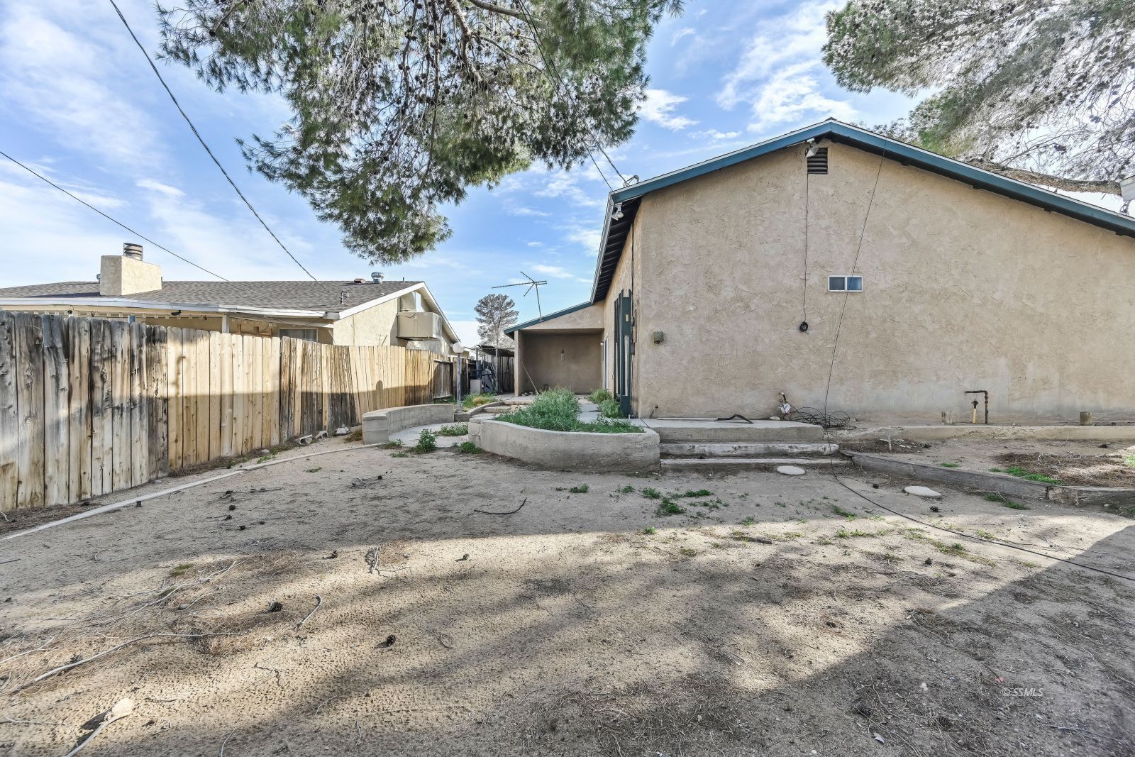 932 West St George Avenue Ridgecrest, CA 93555 - Photo 27 of 28 a view of a house with a yard