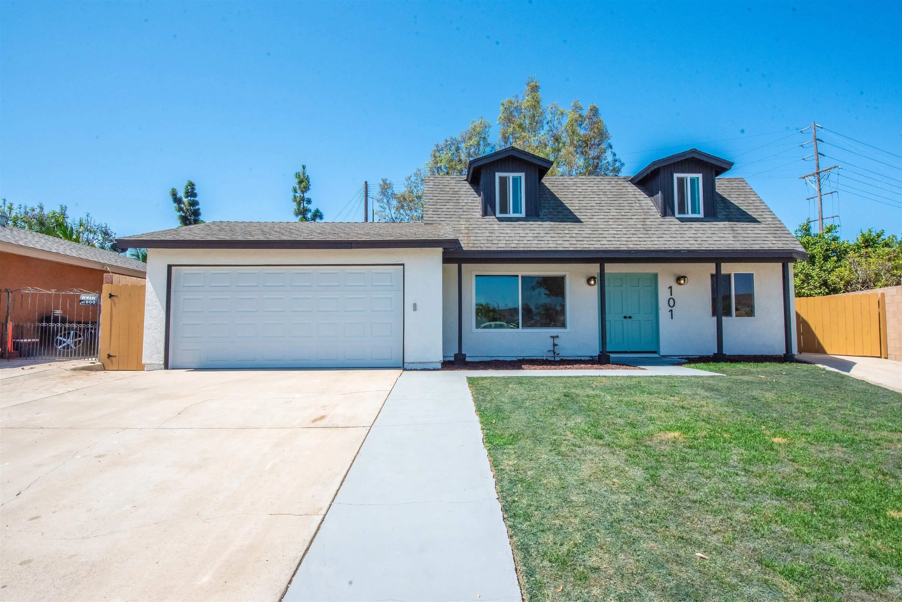 101 Monroe Street Oceanside, CA 92057 - Photo 2 of 40 a front view of a house with a yard
