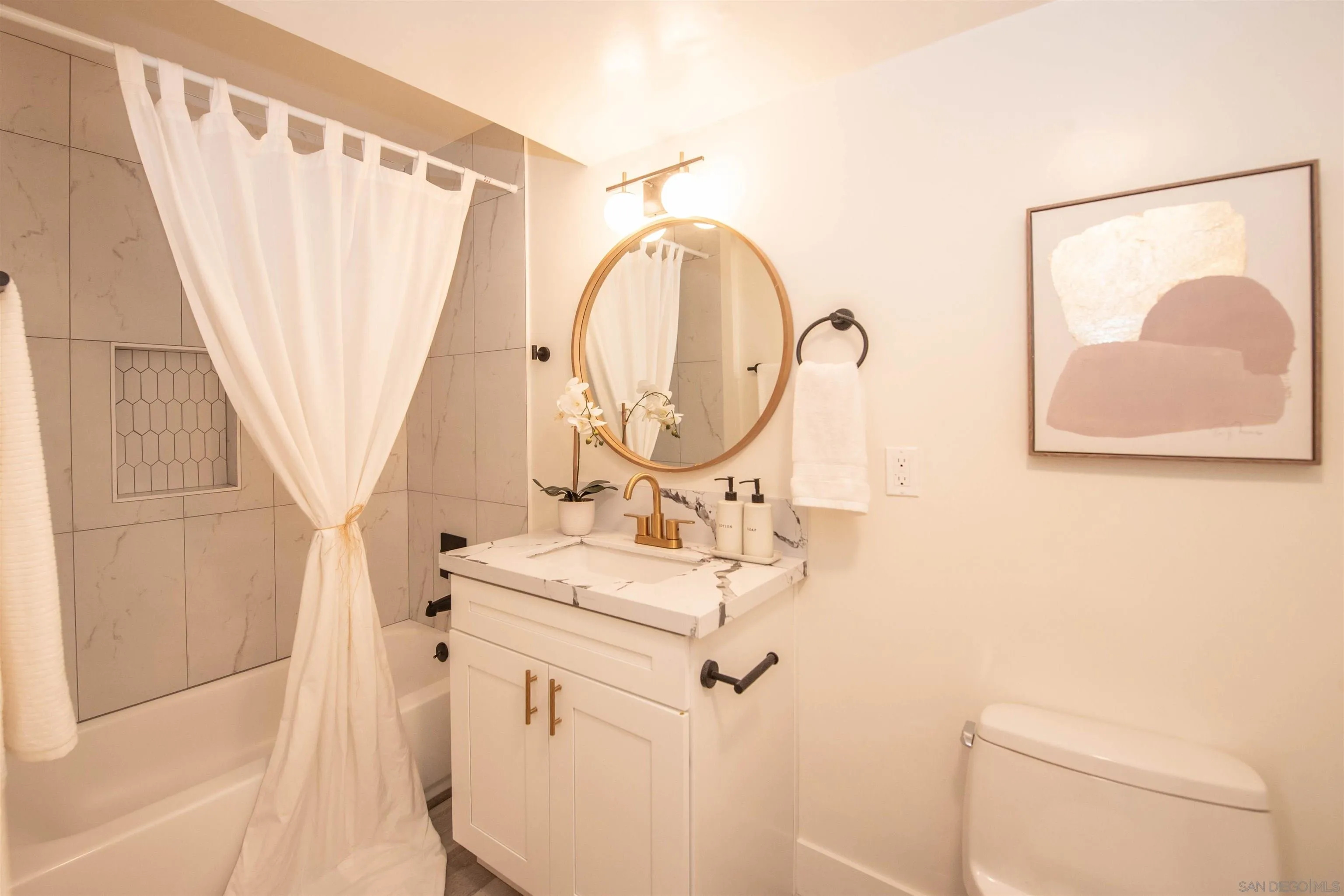 101 Monroe Street Oceanside, CA 92057 - Photo 21 of 40 a bathroom with a sink and a mirror