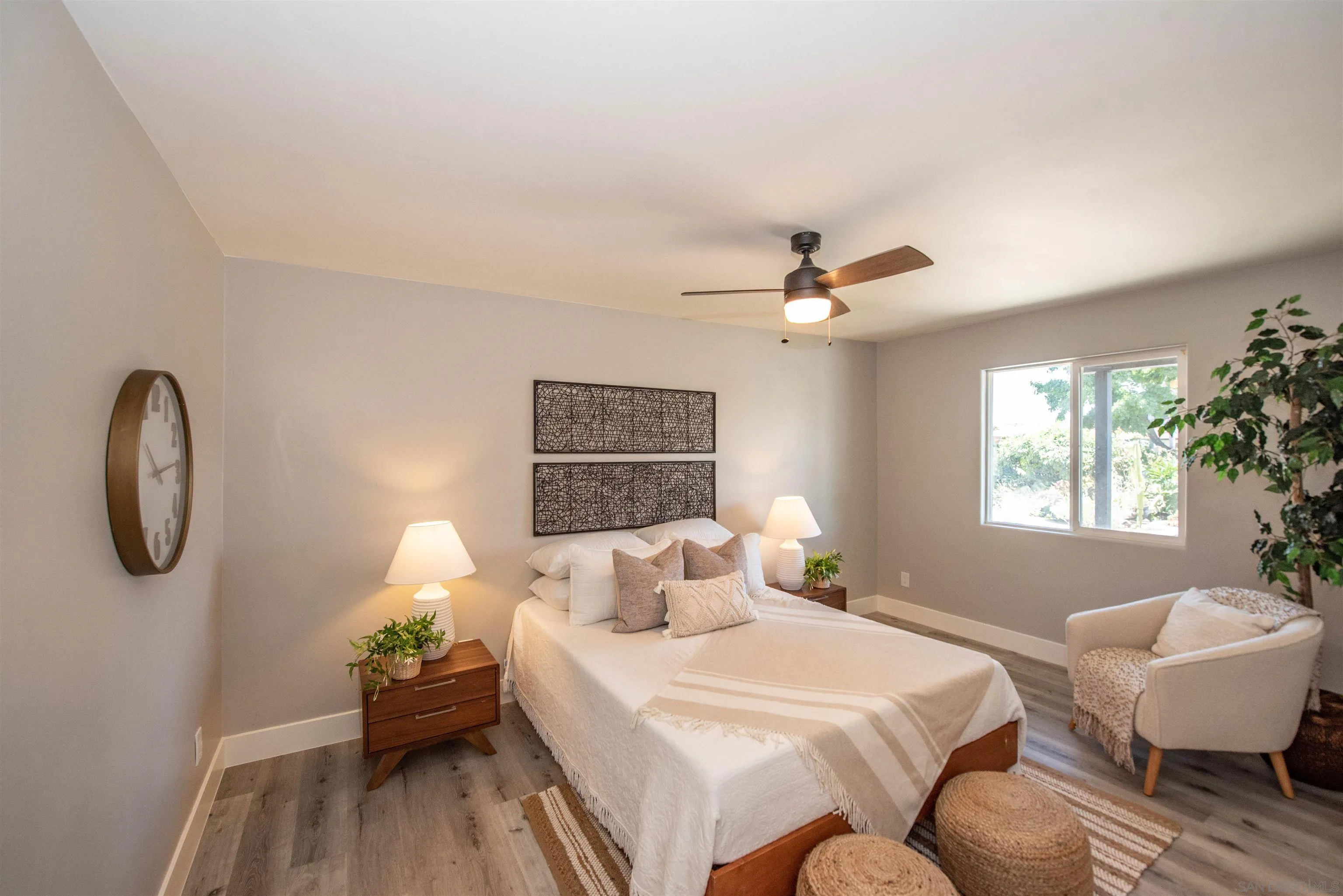 101 Monroe Street Oceanside, CA 92057 - Photo 22 of 40 a bedroom with a bed and a window