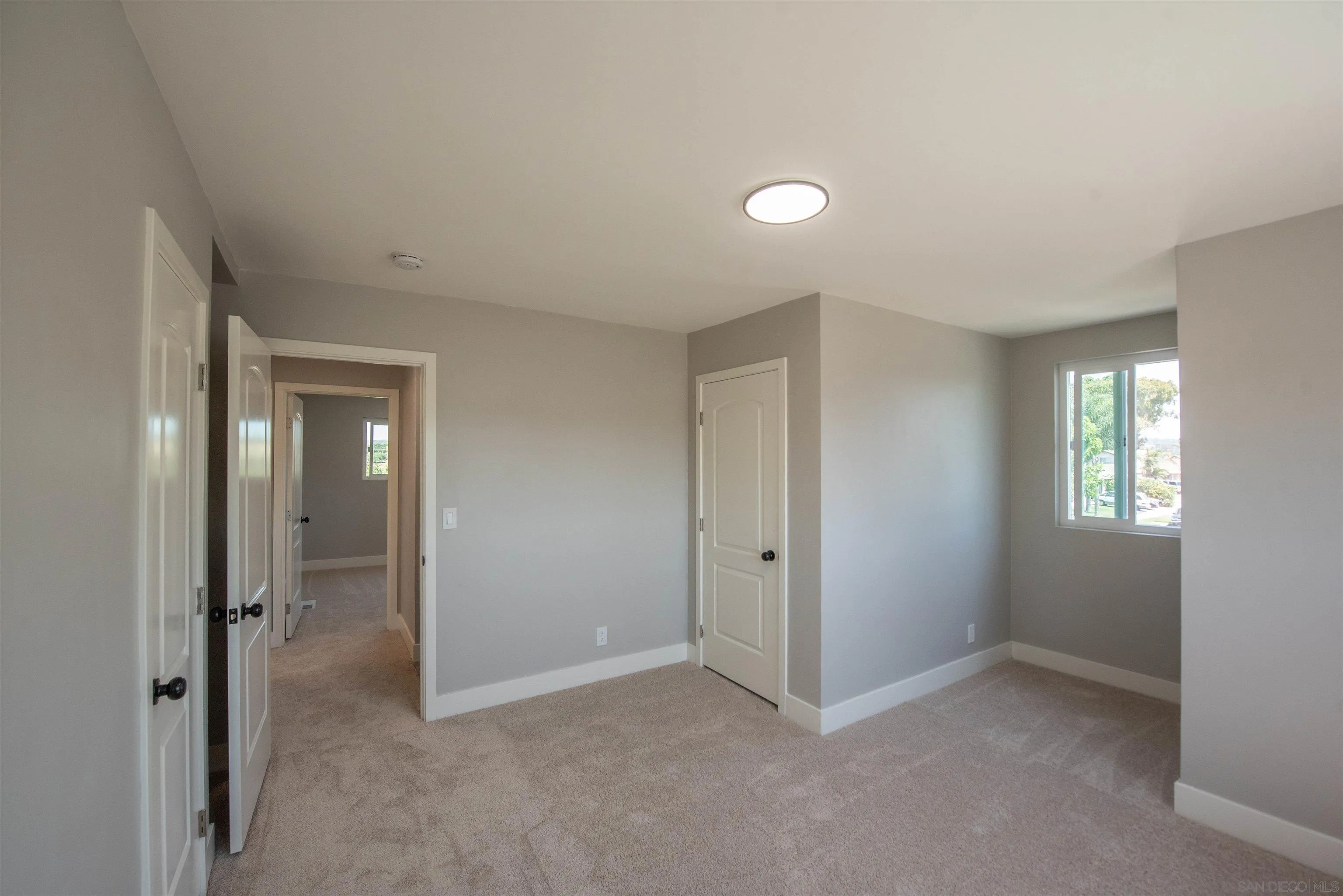101 Monroe Street Oceanside, CA 92057 - Photo 27 of 40 a view of an empty room and window