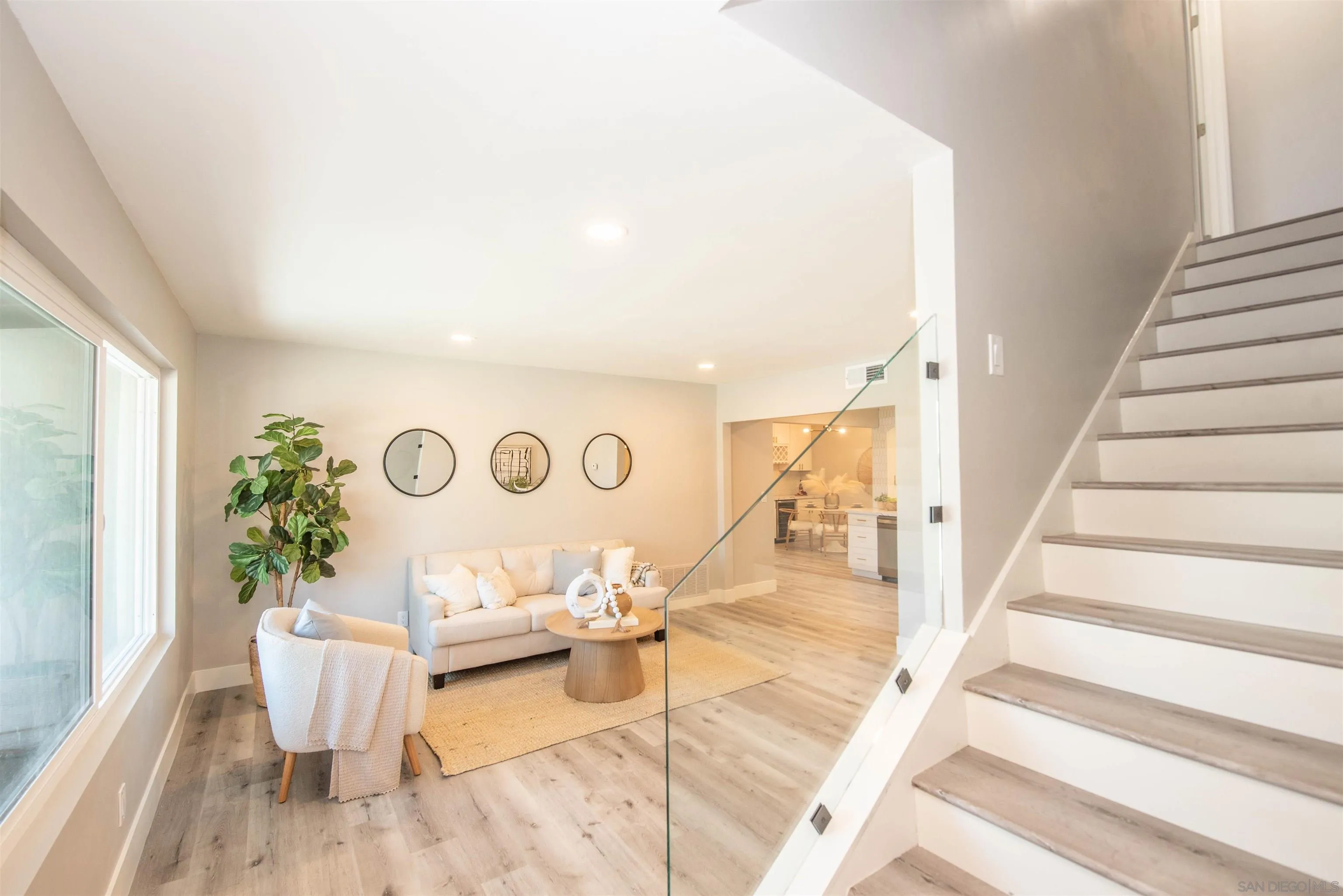 101 Monroe Street Oceanside, CA 92057 - Photo 7 of 40 a living room with furniture and a table