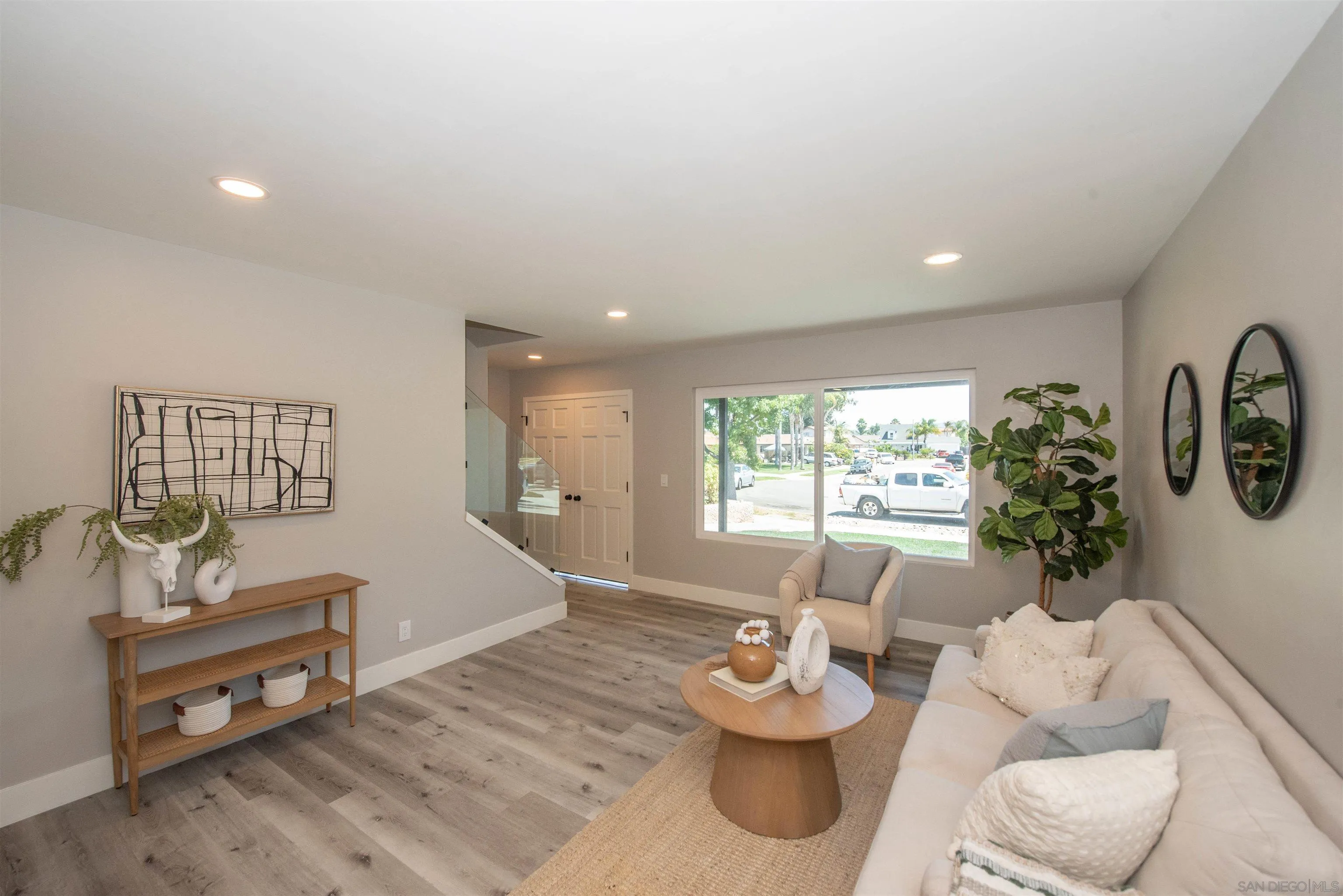 101 Monroe Street Oceanside, CA 92057 - Photo 9 of 40 a living room with furniture and a large window