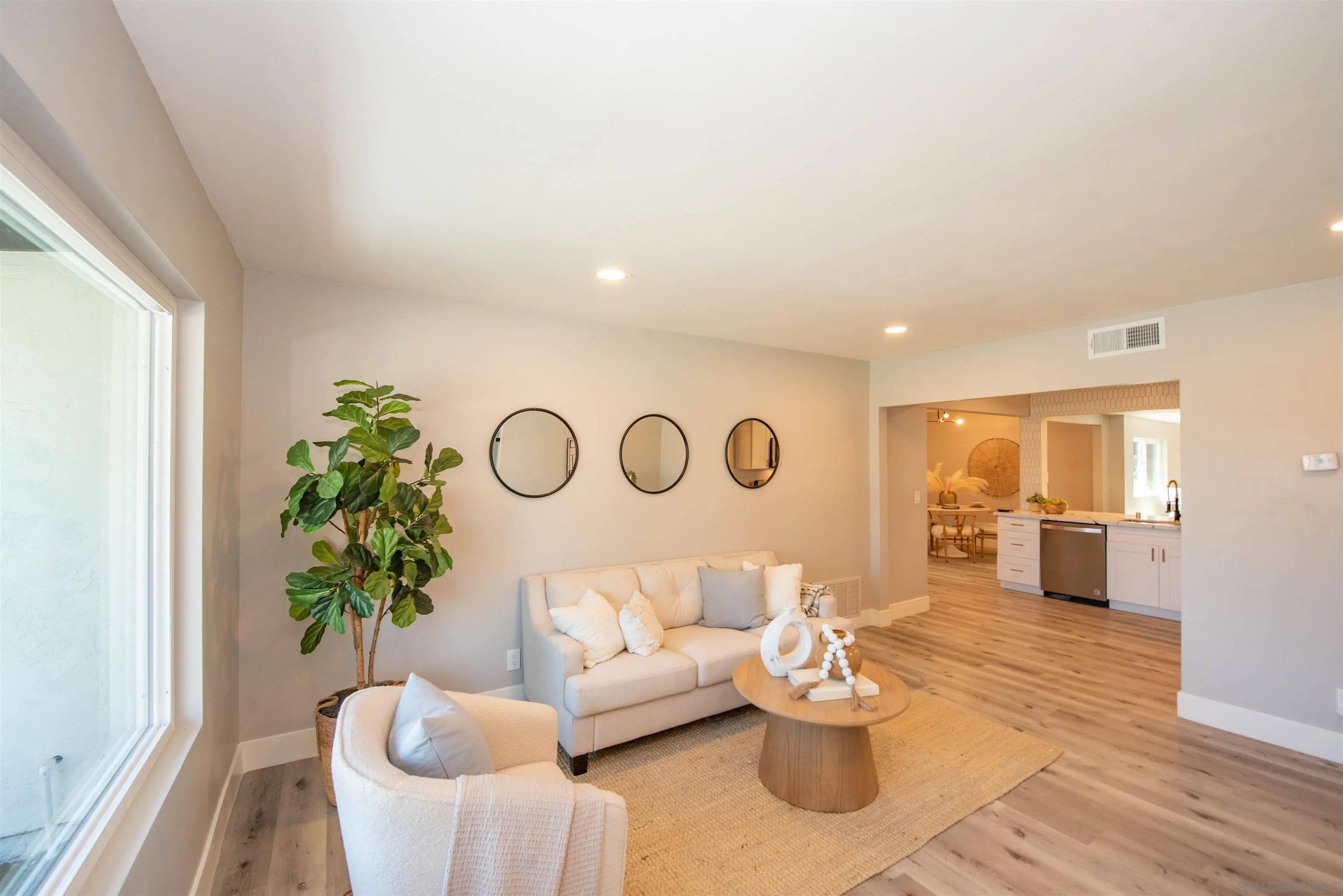 101 Monroe Street Oceanside, CA 92057 - Photo 10 of 40 a living room with furniture and wooden floor