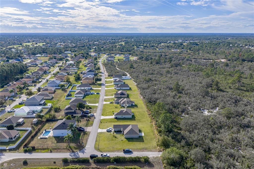 4514 Adrienne Street Sebring, FL 33872 - Photo 3 of 55 an aerial view of residential houses with outdoor space