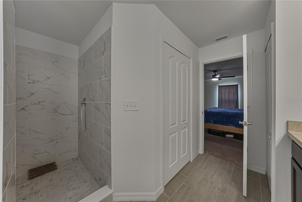 4514 Adrienne Street Sebring, FL 33872 - Photo 39 of 55 a bathroom with a bathtub