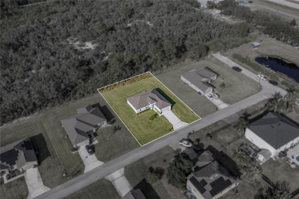 4514 Adrienne Street Sebring, FL 33872 - Photo 5 of 55 an aerial view of a house