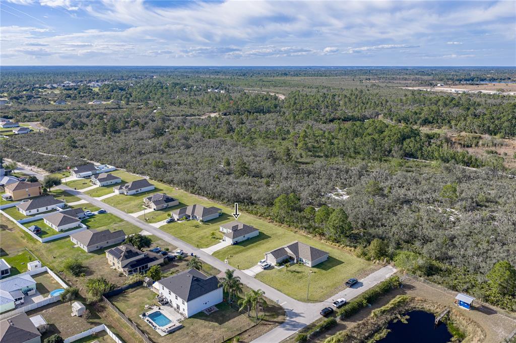 4514 Adrienne Street Sebring, FL 33872 - Photo 55 of 55 an aerial view of residential houses with outdoor space