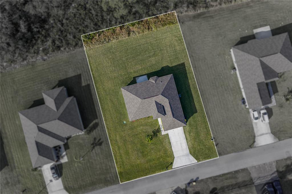 4514 Adrienne Street Sebring, FL 33872 - Photo 6 of 55 an aerial view of residential houses with outdoor space