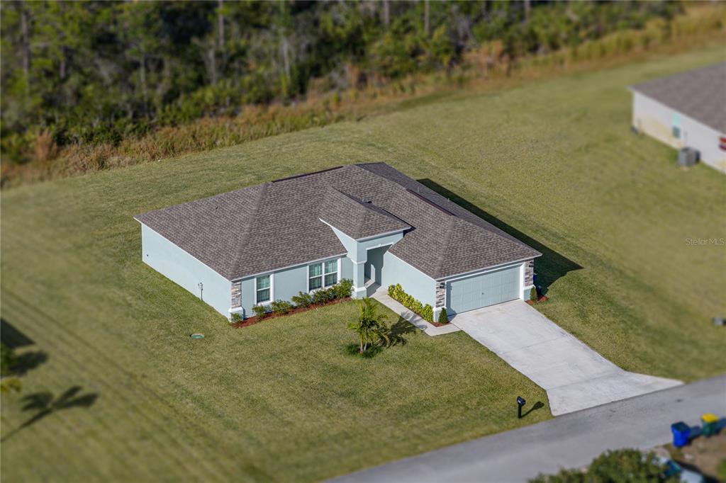 4514 Adrienne Street Sebring, FL 33872 - Photo 7 of 55 an aerial view of a house with a yard