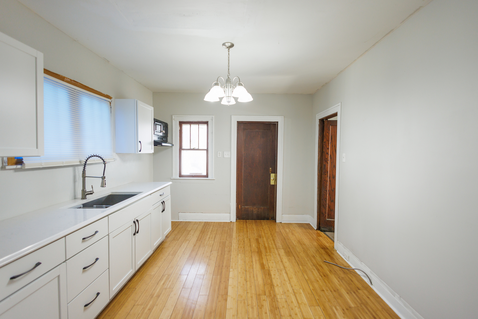 378 South Evergreen Avenue Kankakee, IL 60901 - Photo 5 of 26 a spacious bathroom with a sink and a mirror
