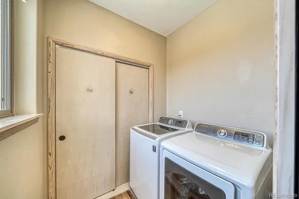 a utility room with dryer and washer