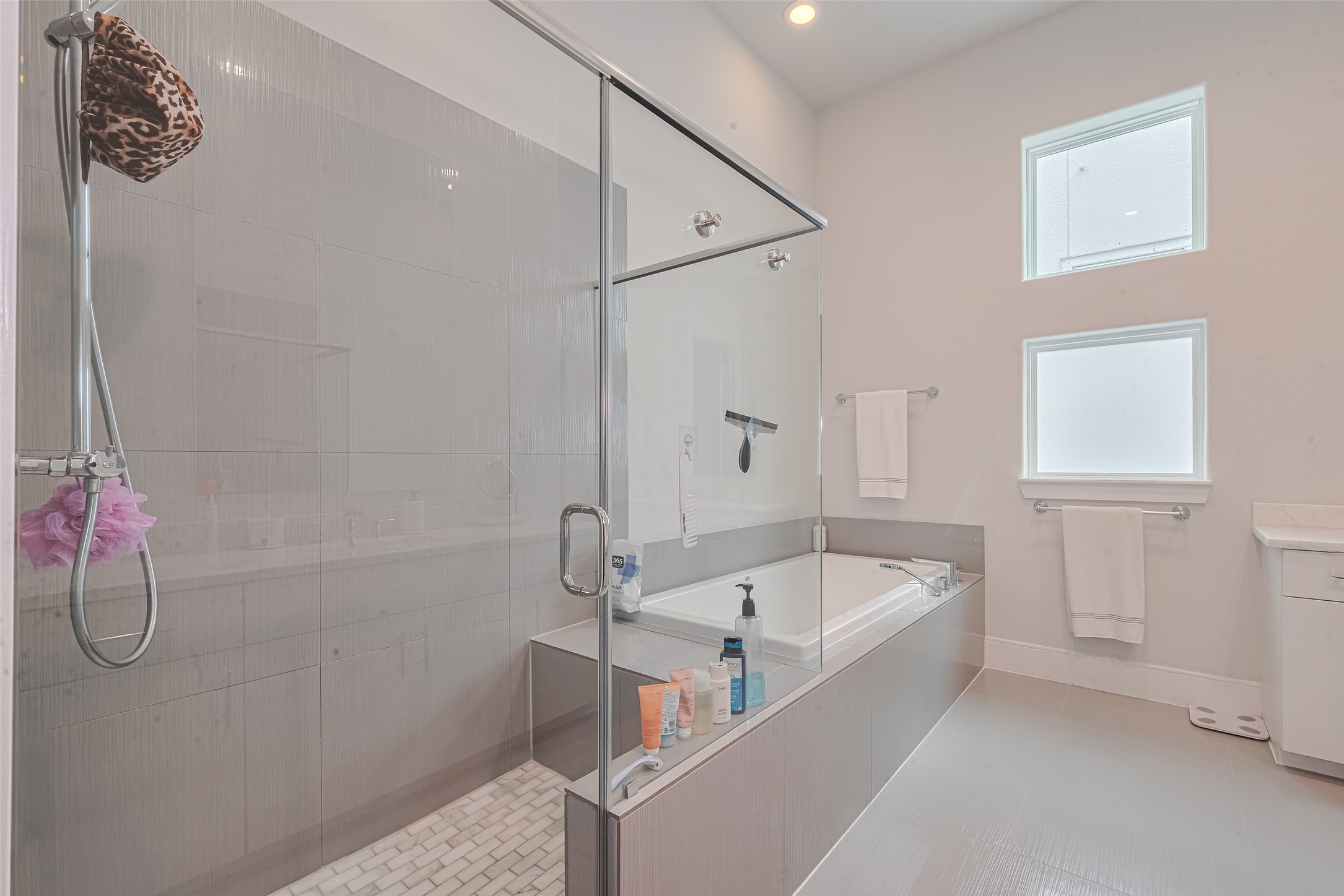 2608 Rusk Street Houston, TX 77003 - Photo 26 of 44 a bathroom with a tub a sink and a shower