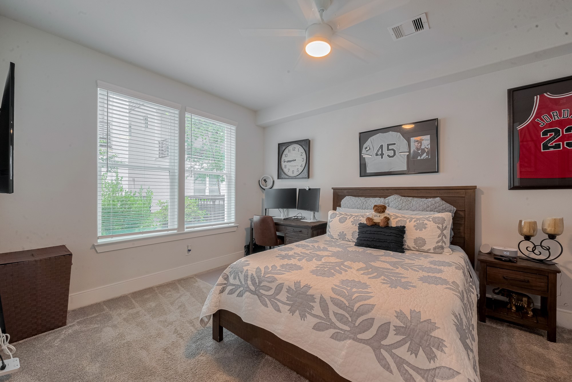 2608 Rusk Street Houston, TX 77003 - Photo 36 of 44 a bed room with a bed and a chair