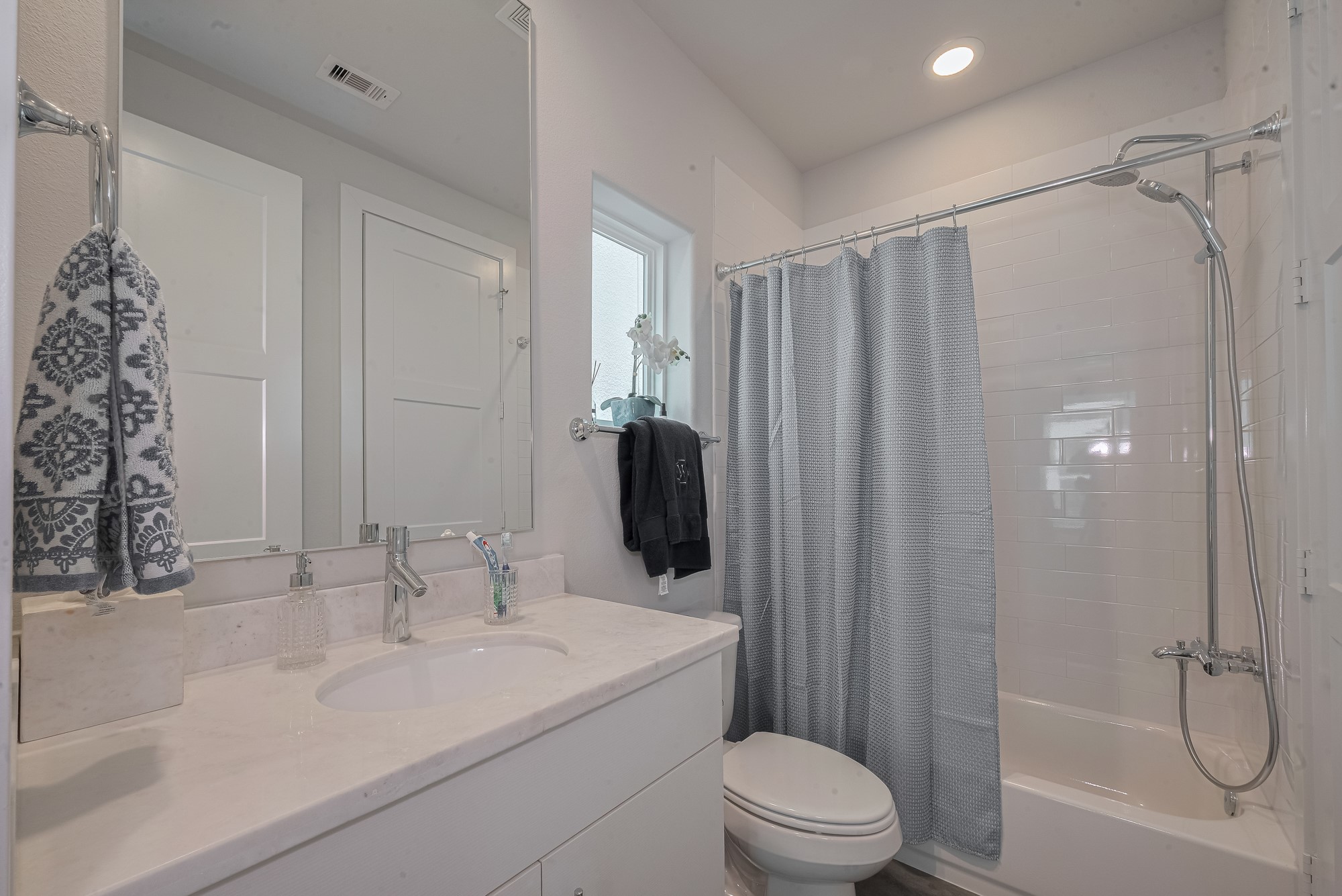 2608 Rusk Street Houston, TX 77003 - Photo 39 of 44 a bathroom with a sink toilet and shower