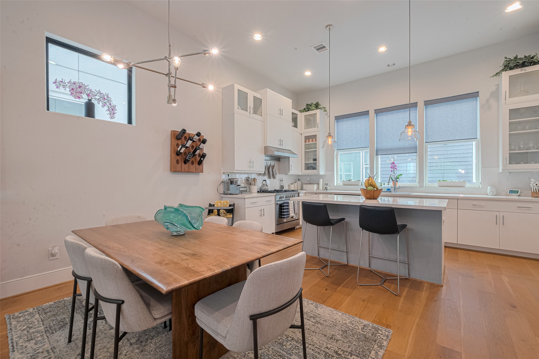 2608 Rusk Street Houston, TX 77003 - Photo 8 of 44 a kitchen with a table and chairs in it
