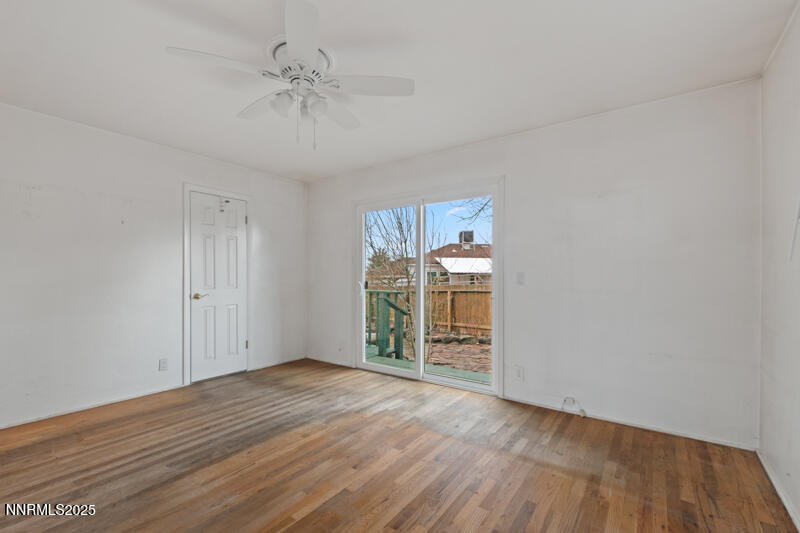 1606 Knoll Drive Reno, NV 89509 - Photo 16 of 30 wooden floor in an empty room with a window