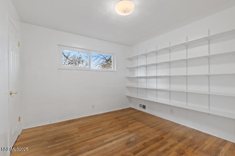 1606 Knoll Drive Reno, NV 89509 - Photo 20 of 30 a view of a room with shelf and cabinet
