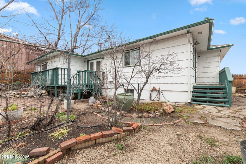 1606 Knoll Drive Reno, NV 89509 - Photo 30 of 30 a backyard of a house with table and chairs