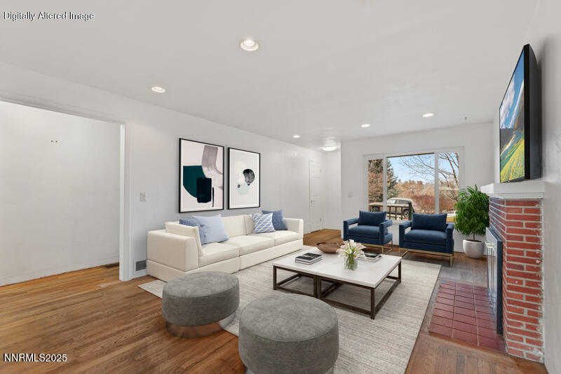 1606 Knoll Drive Reno, NV 89509 - Photo 8 of 30 a living room with furniture and a flat screen tv