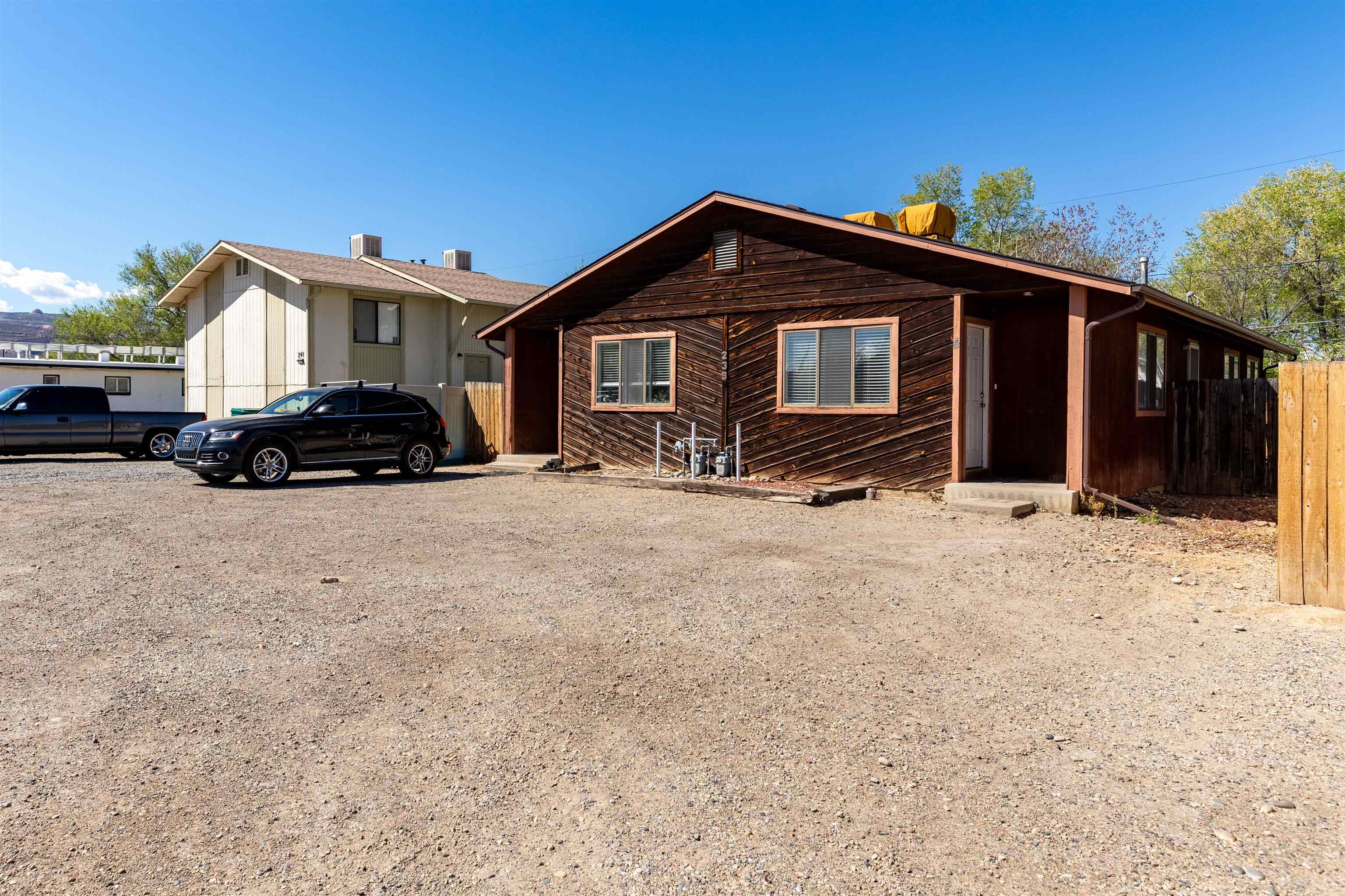 239 South Elm Street, Unit A Fruita, CO 81521 - Photo 1 of 22 a car parked in front of house