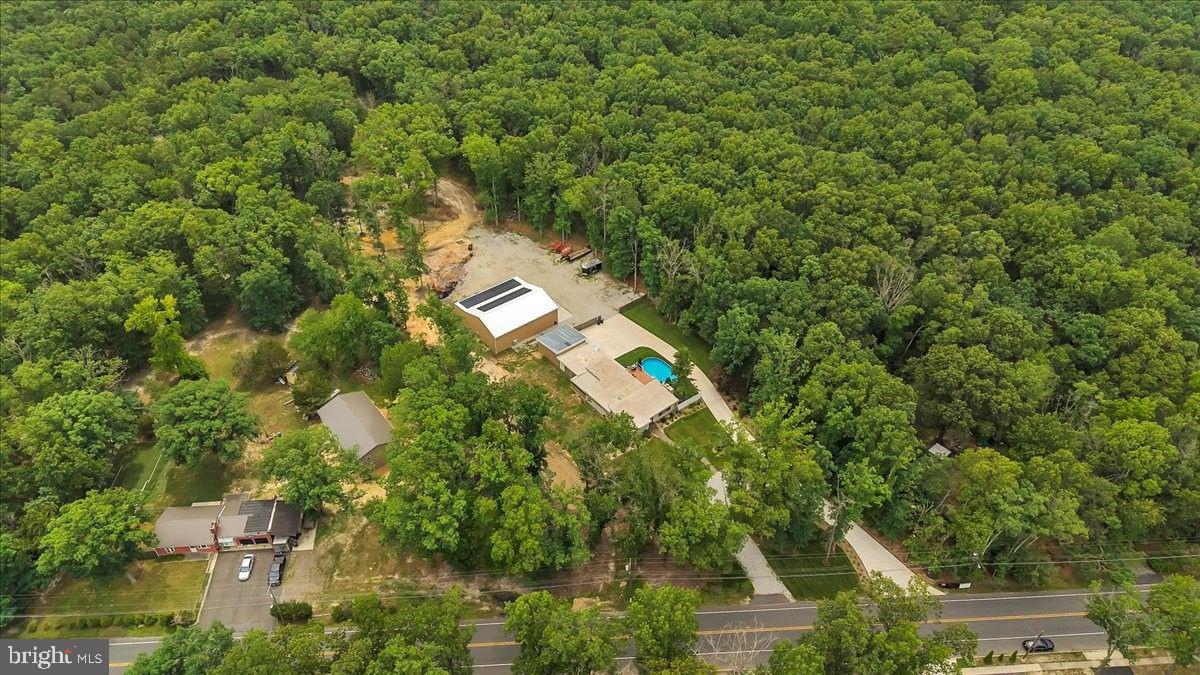 64 Blue Anchor Road Sicklerville, NJ 08081 - Photo 46 of 47 an aerial view of a house with a yard and lake view
