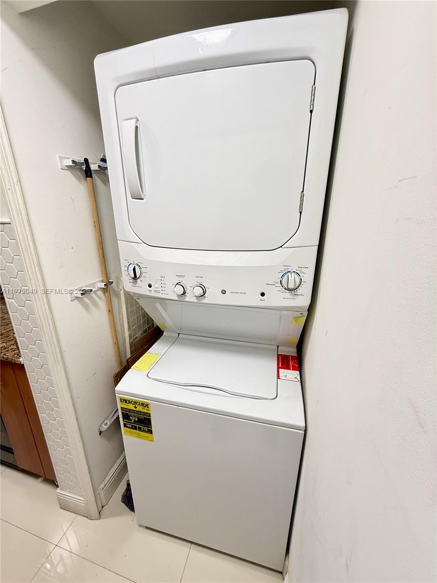 2701 Southwest 3rd Avenue, Unit 202 Miami, FL 33129 - Photo 16 of 32 a utility room with dryer and washer
