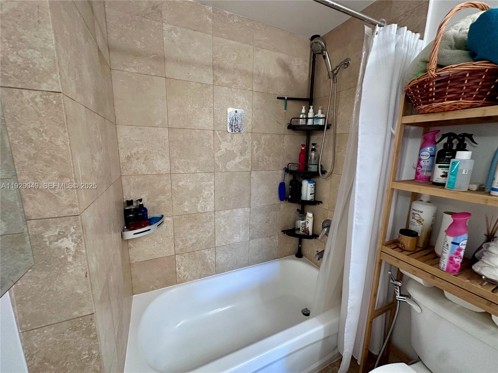 2701 Southwest 3rd Avenue, Unit 202 Miami, FL 33129 - Photo 24 of 32 a bathroom with a bathtub