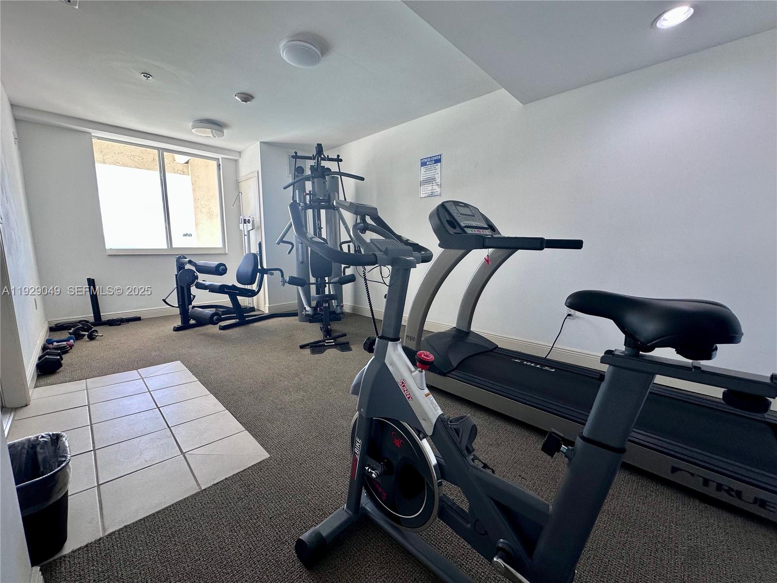 2701 Southwest 3rd Avenue, Unit 202 Miami, FL 33129 - Photo 31 of 32 a view of a room with gym equipment