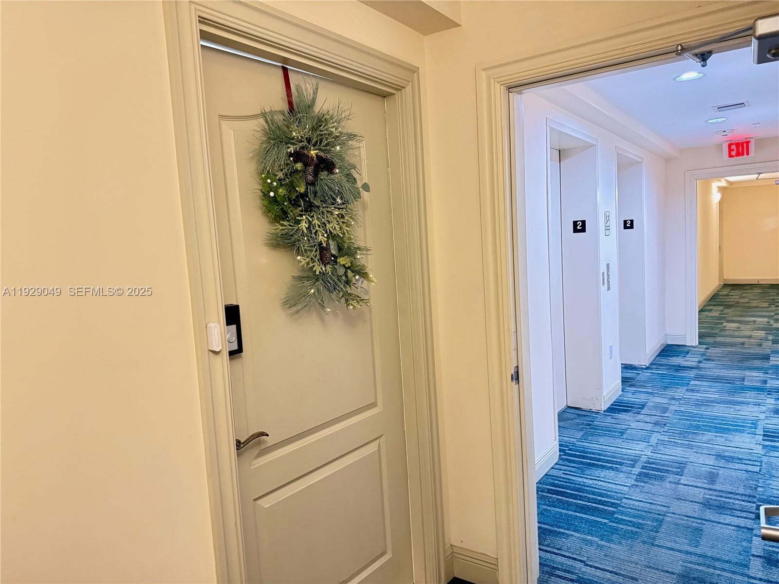 2701 Southwest 3rd Avenue, Unit 202 Miami, FL 33129 - Photo 8 of 32 a view of a hallway with wooden floor and entryway