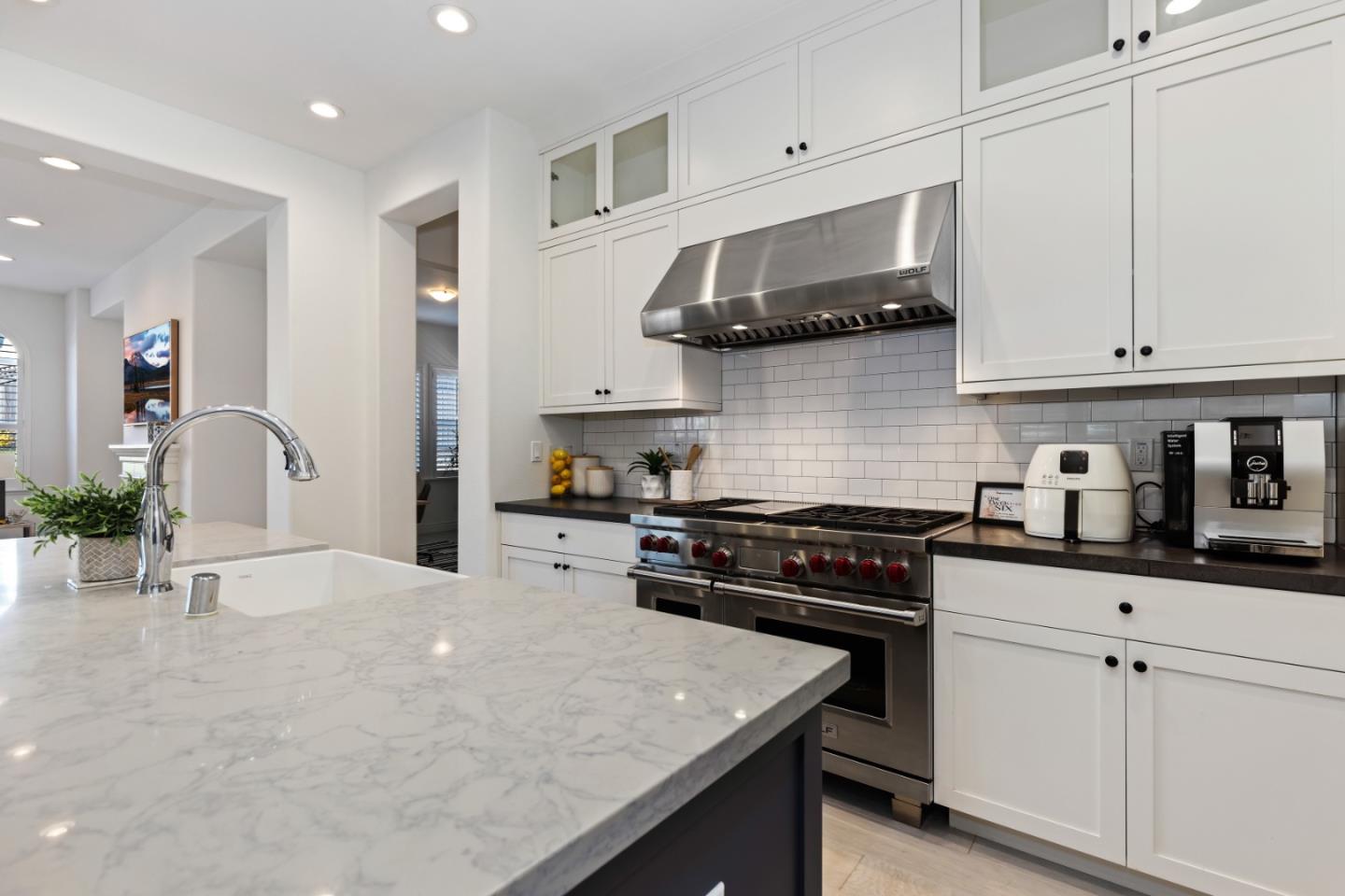 111 Dunfirth Drive Hayward, CA 94542 - Photo 15 of 49 a kitchen with stainless steel appliances a sink a stove and cabinets