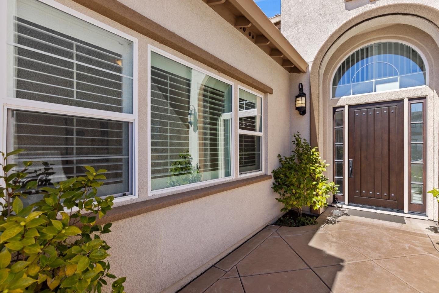 111 Dunfirth Drive Hayward, CA 94542 - Photo 3 of 49 a house with a entryway door and potted plants
