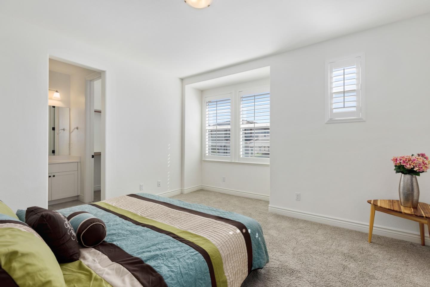 111 Dunfirth Drive Hayward, CA 94542 - Photo 38 of 49 a bedroom with a bed and a window