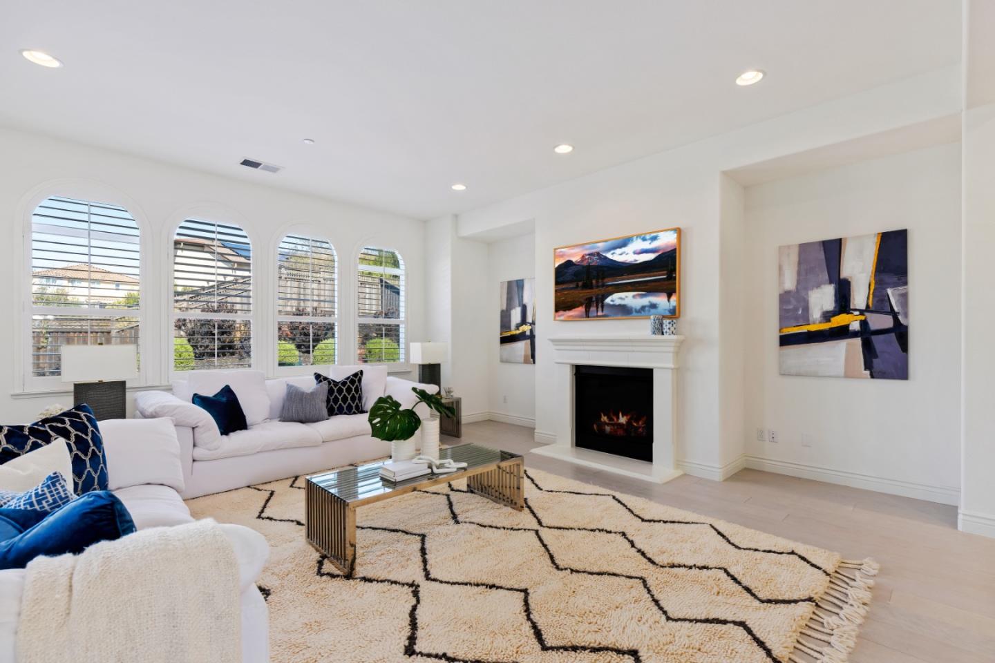 111 Dunfirth Drive Hayward, CA 94542 - Photo 8 of 49 a living room with furniture a fireplace and a flat screen tv