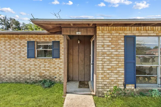 a front view of a house with a window