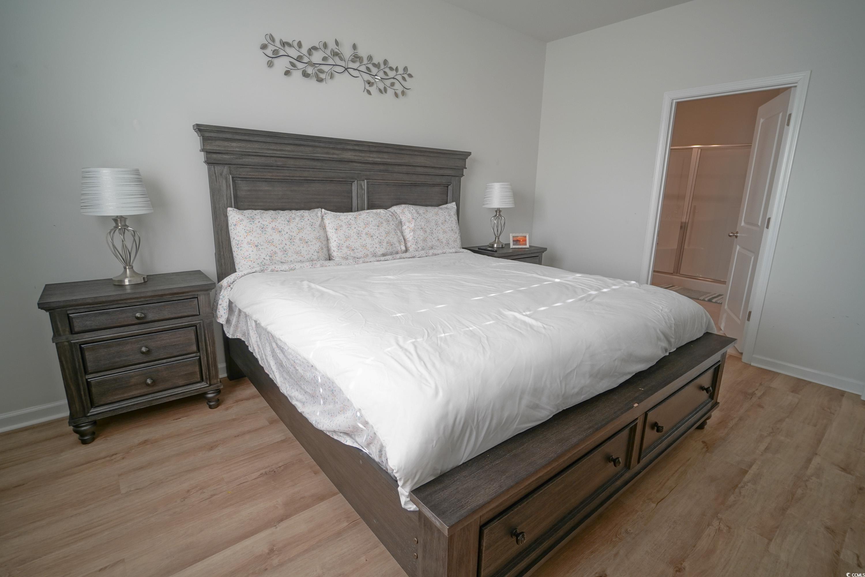 240 Pin Oak Drive Murrells Inlet, SC 29576 - Photo 17 of 40 Bedroom featuring light hardwood / wood-style floo