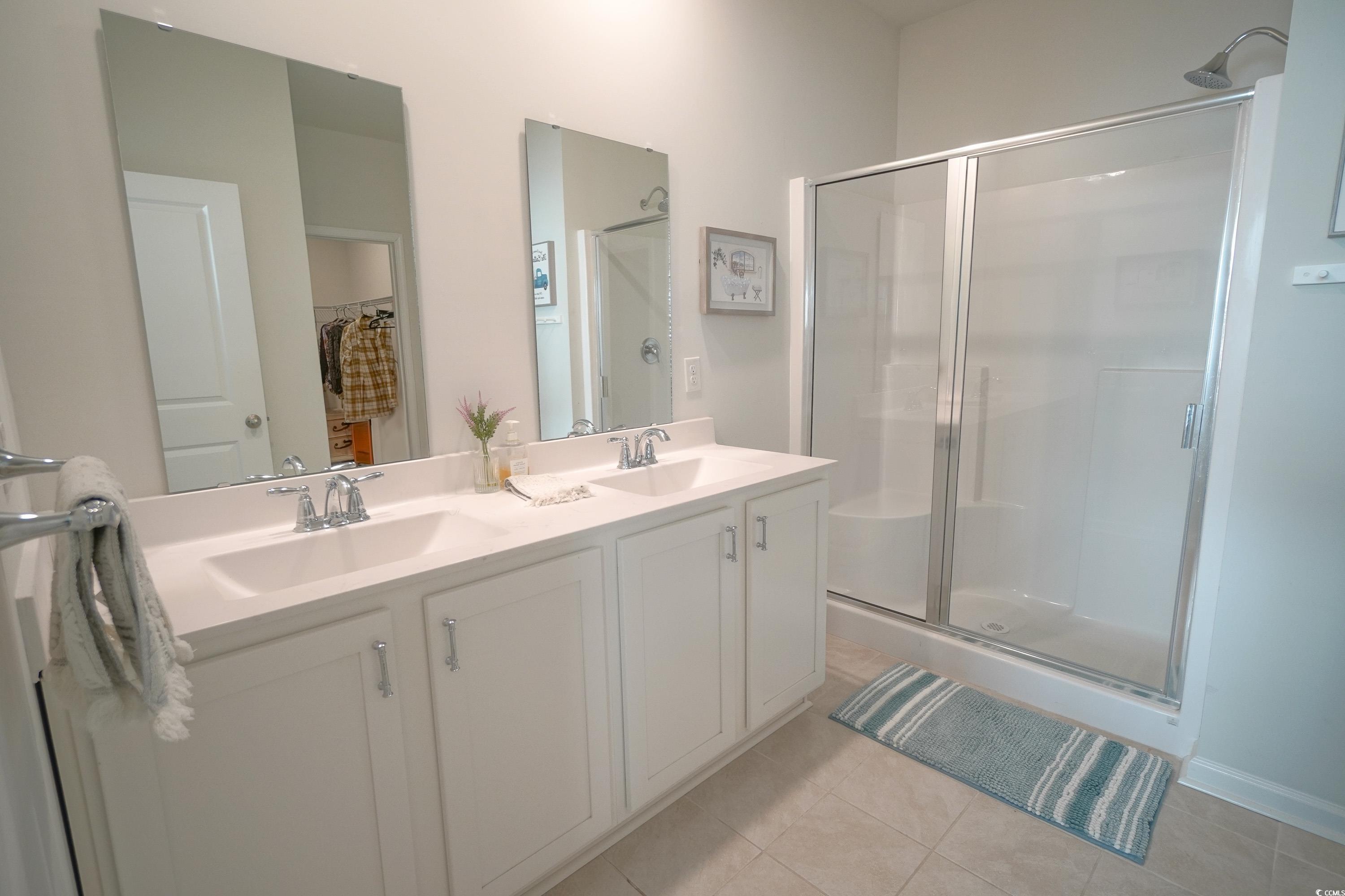 240 Pin Oak Drive Murrells Inlet, SC 29576 - Photo 18 of 40 Bathroom with vanity, tile patterned floors, and w