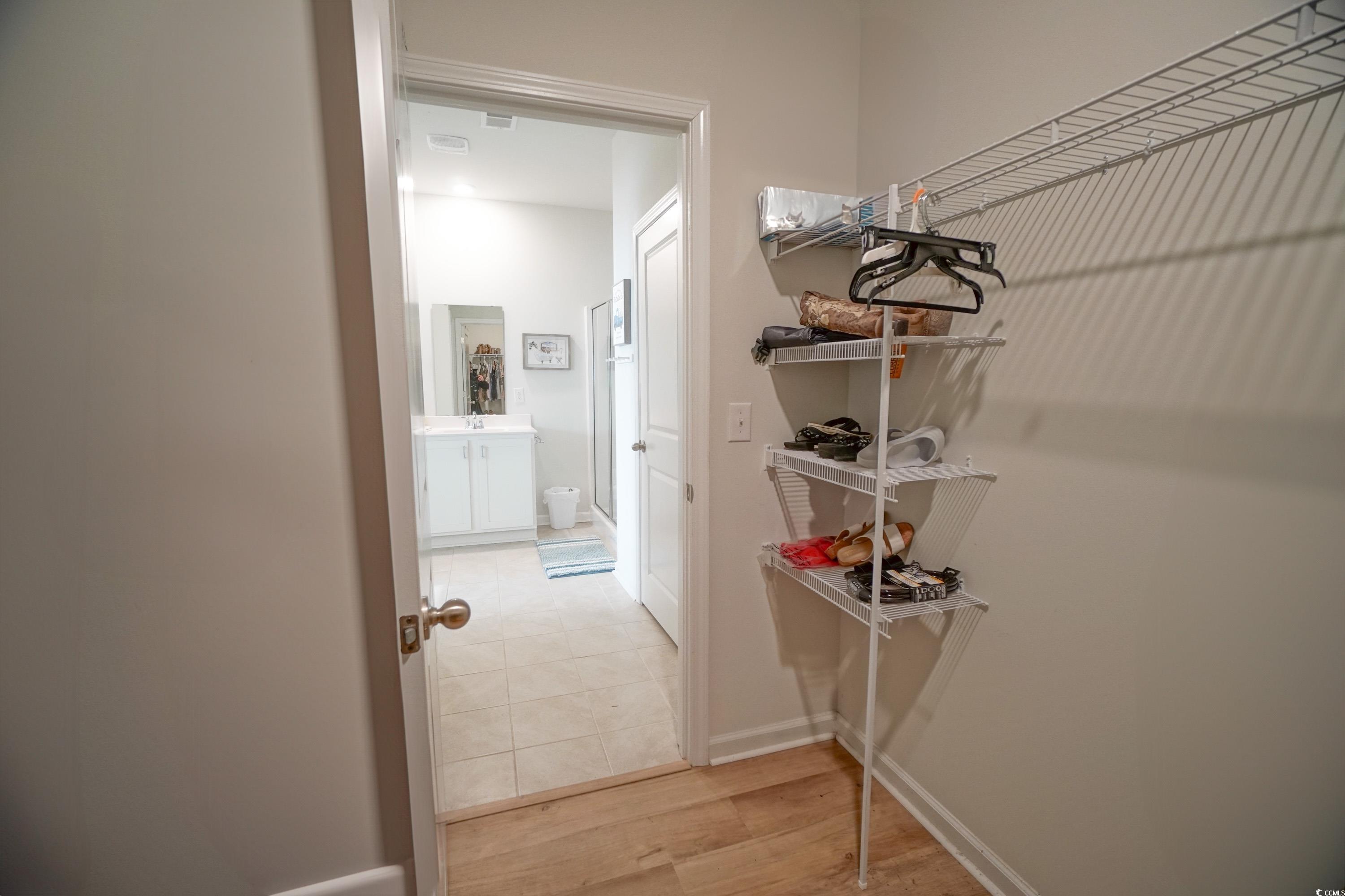 240 Pin Oak Drive Murrells Inlet, SC 29576 - Photo 20 of 40 Spacious closet featuring wood-type flooring and s