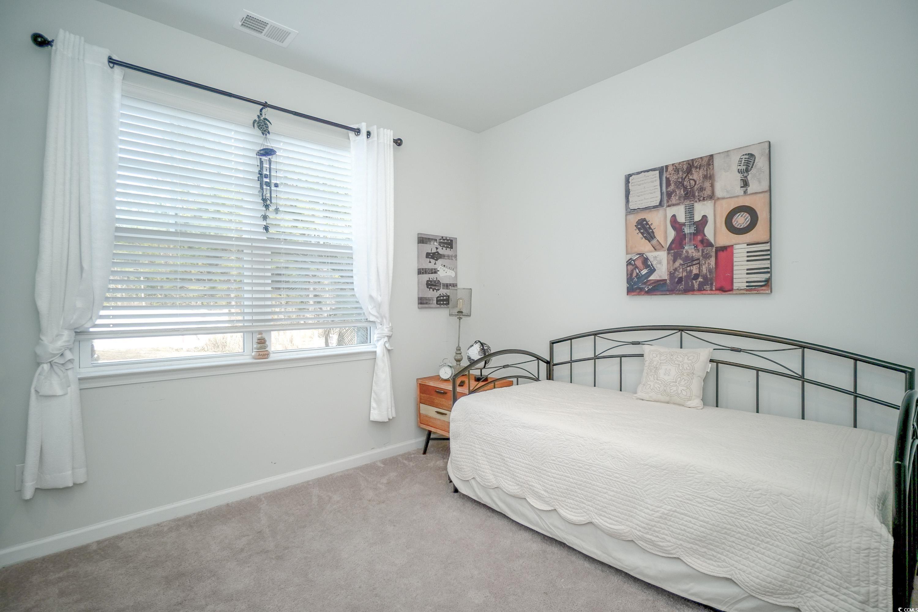 240 Pin Oak Drive Murrells Inlet, SC 29576 - Photo 23 of 40 View of carpeted bedroom