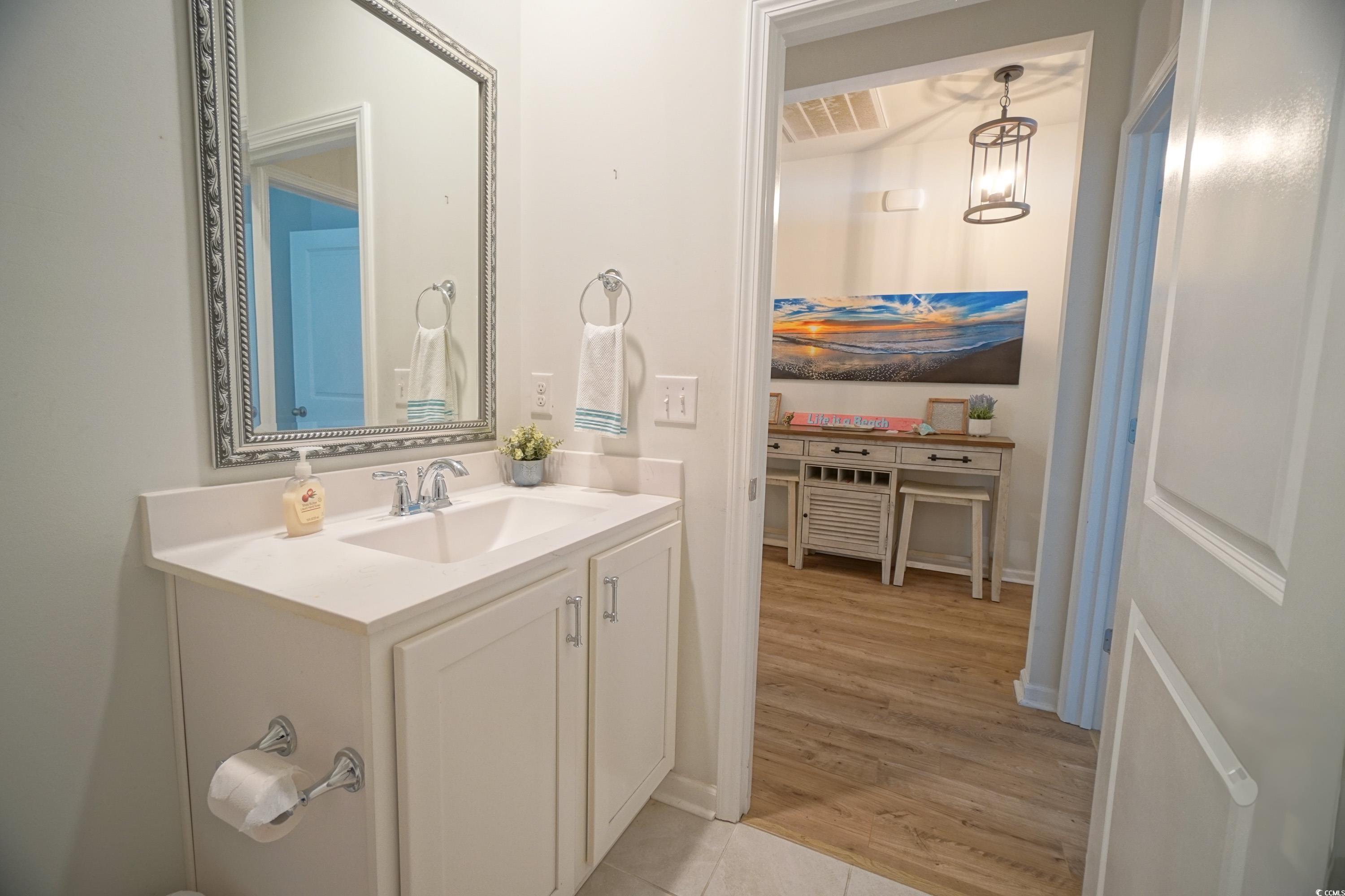 240 Pin Oak Drive Murrells Inlet, SC 29576 - Photo 27 of 40 Bathroom with hardwood / wood-style flooring and v