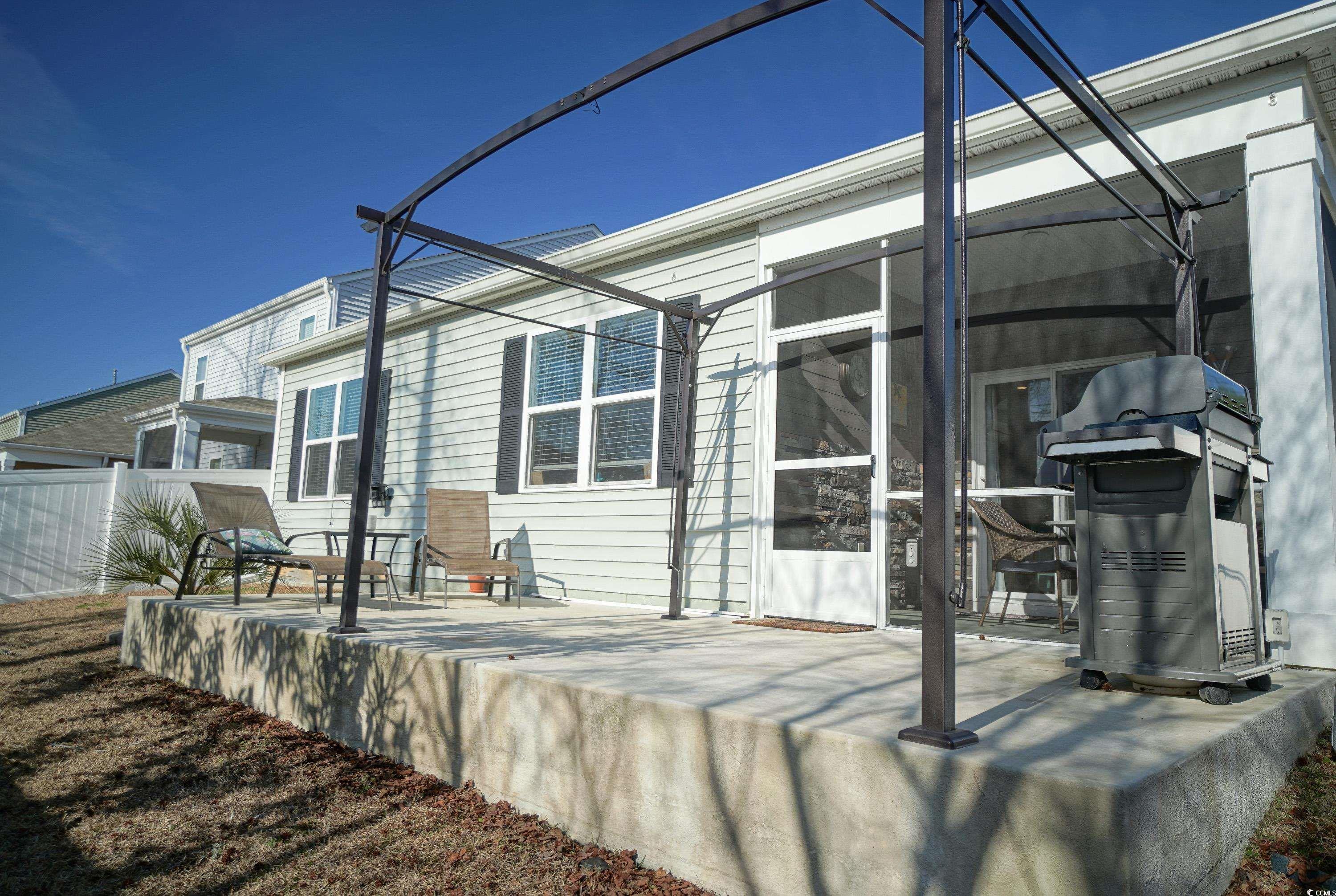 240 Pin Oak Drive Murrells Inlet, SC 29576 - Photo 36 of 40 Rear view of house featuring a patio
