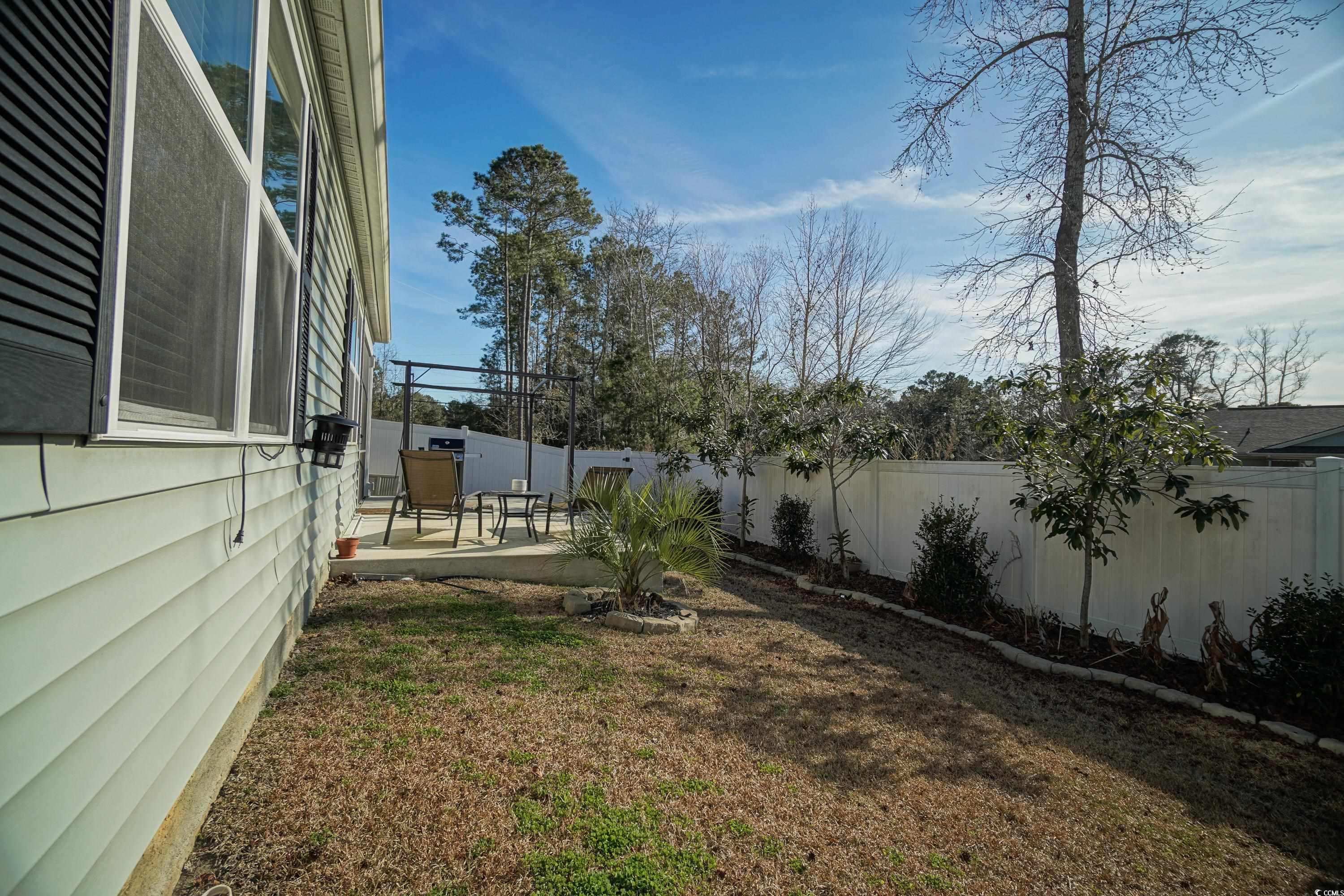 240 Pin Oak Drive Murrells Inlet, SC 29576 - Photo 37 of 40 View of yard featuring a patio