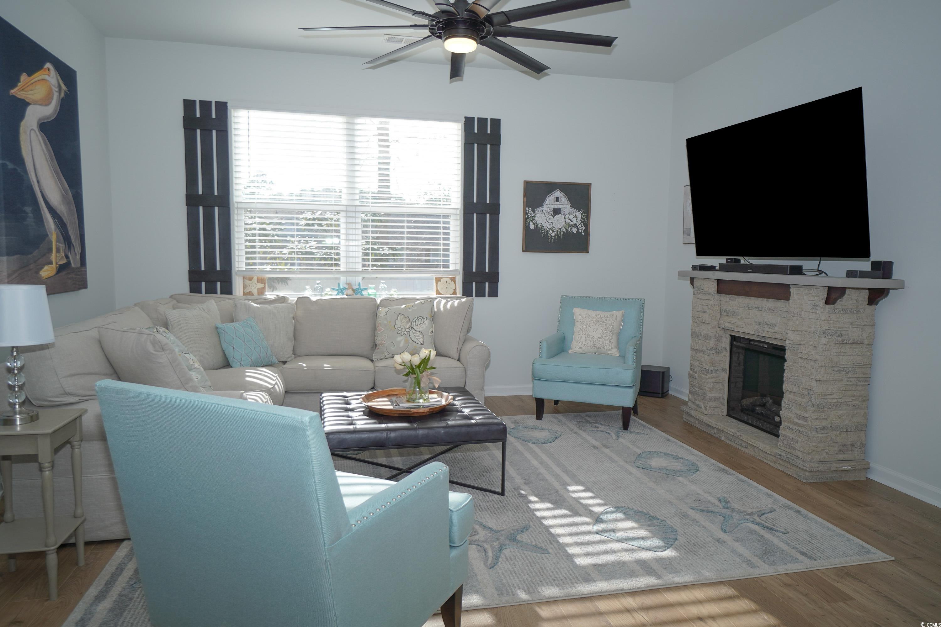 240 Pin Oak Drive Murrells Inlet, SC 29576 - Photo 7 of 40 Living room with ceiling fan, wood-type flooring,