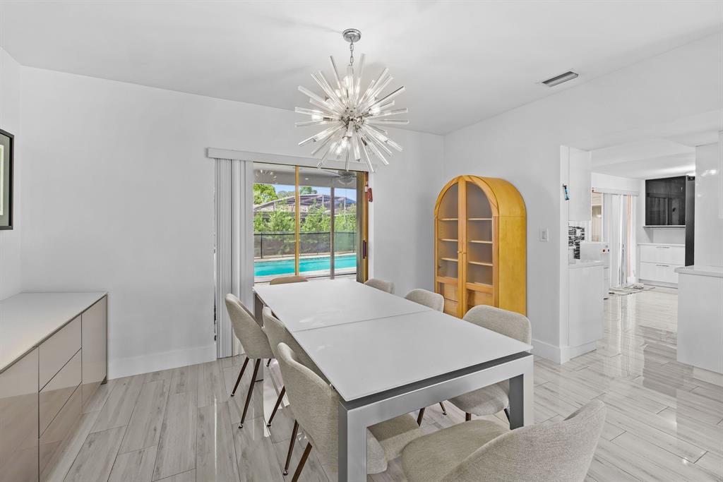 3500 North 46th Avenue Hollywood, FL 33021 - Photo 7 of 13 a view of a dining room with furniture window and wooden floor
