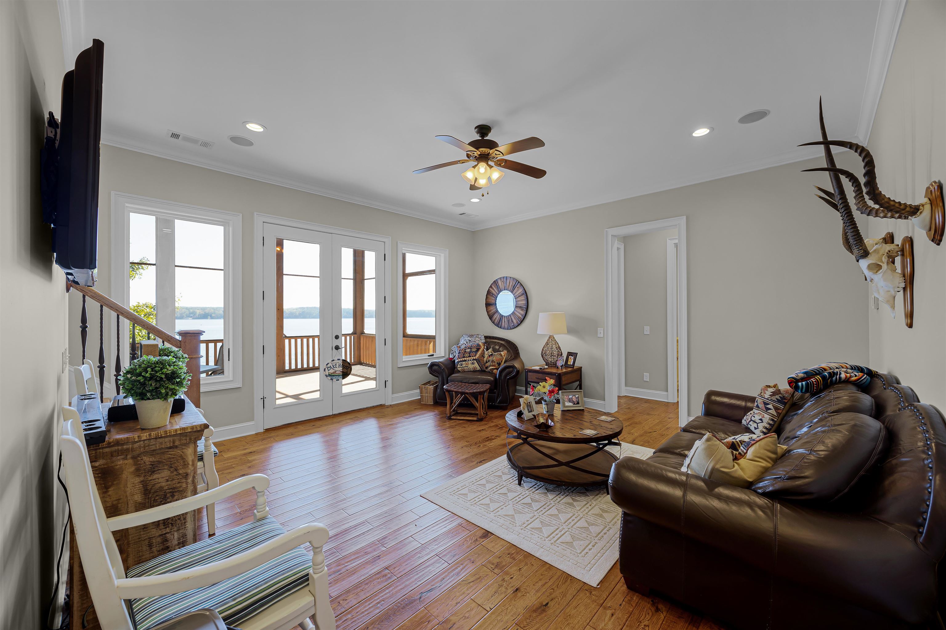 45 Pinnacle Pointe Savannah, TN 38372 - Photo 20 of 30 Downstairs den featuring french doors, ornamental molding, ceiling fan, light wood floors, and recessed lighting